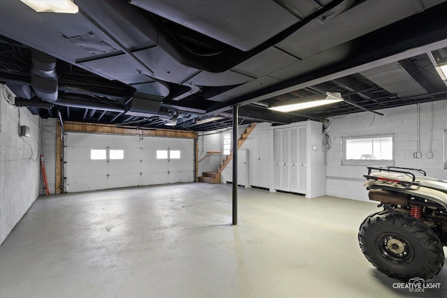 garage featuring concrete block wall