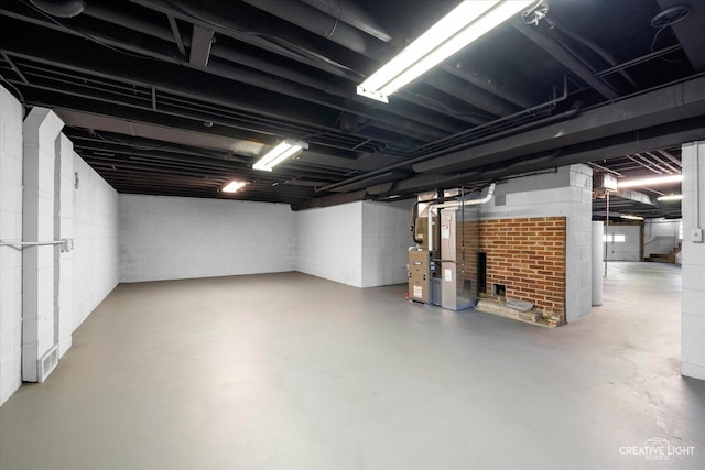 unfinished basement with heating unit