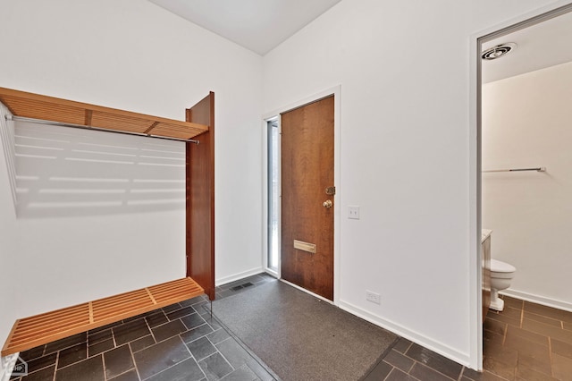 mudroom featuring baseboards