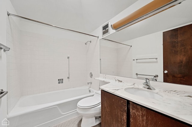 full bathroom featuring vanity, bathing tub / shower combination, toilet, and tile patterned flooring