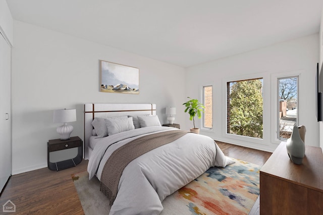 bedroom featuring wood finished floors