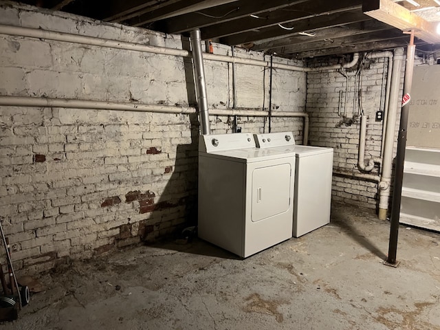 laundry area with separate washer and dryer and laundry area