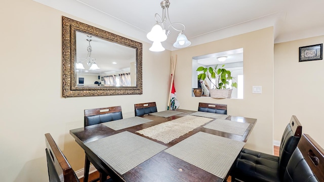 dining room with a chandelier