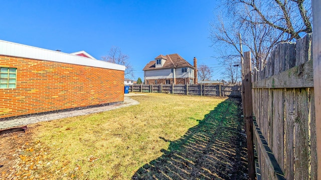 view of yard featuring a fenced backyard