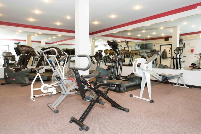 gym featuring recessed lighting, visible vents, and a wall mounted AC