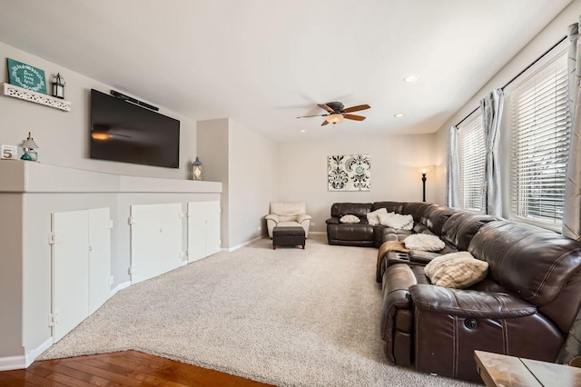 living room featuring recessed lighting, baseboards, ceiling fan, and wood finished floors