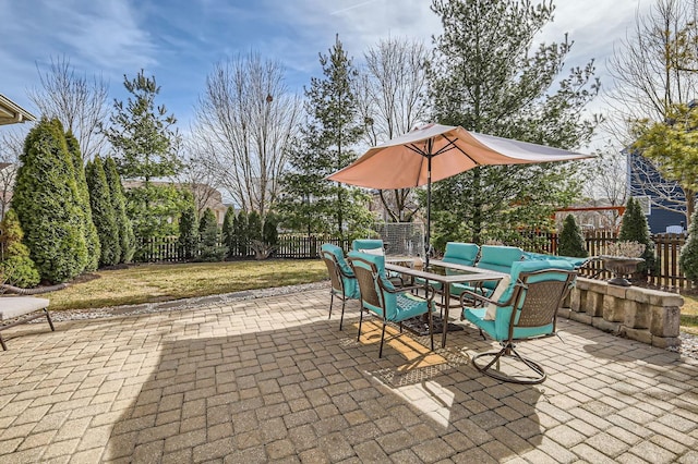 view of patio / terrace featuring fence