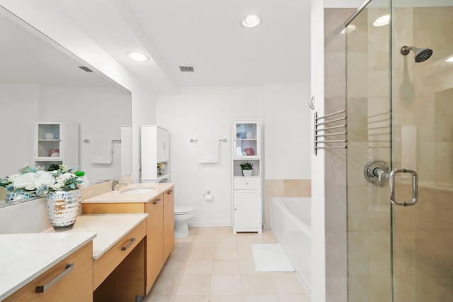 bathroom featuring visible vents, a stall shower, vanity, and a bath