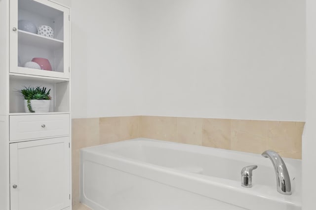 bathroom featuring a garden tub