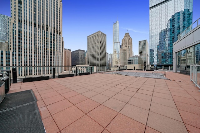 view of patio featuring a view of city