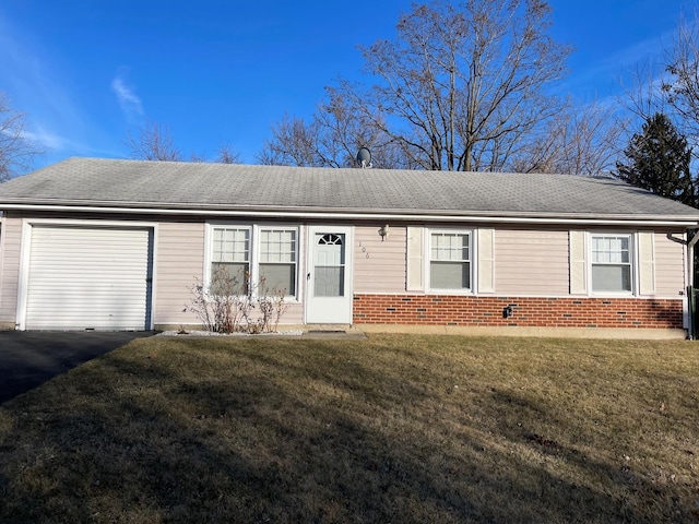 ranch-style home with a front yard, driveway, roof with shingles, an attached garage, and brick siding