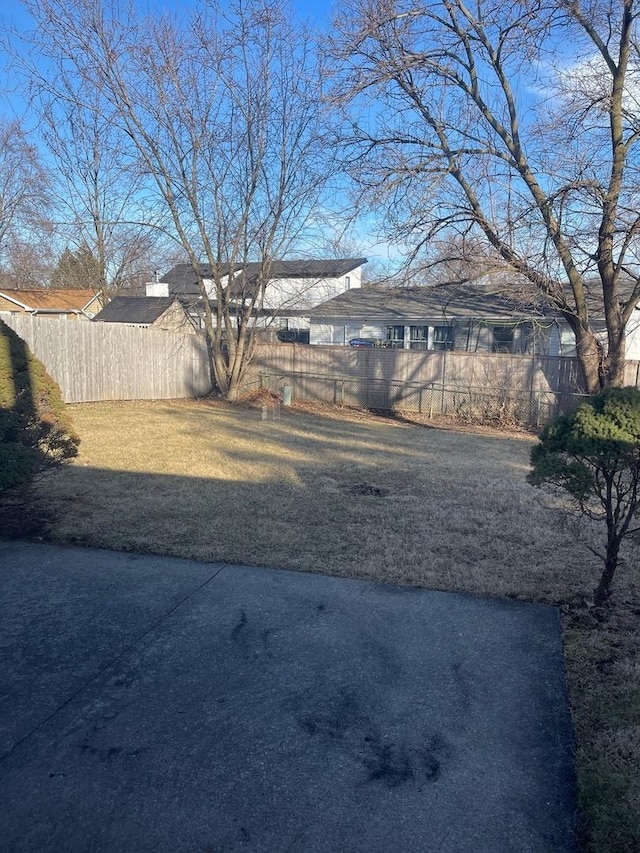 view of yard with fence