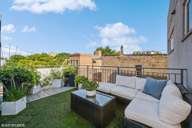 exterior space with a balcony and outdoor lounge area