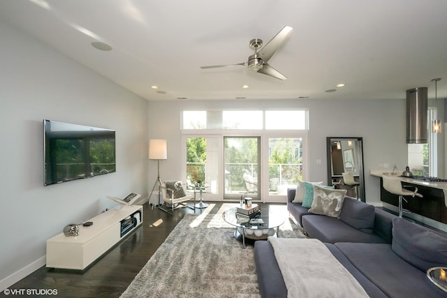 living area with recessed lighting, baseboards, dark wood finished floors, and ceiling fan