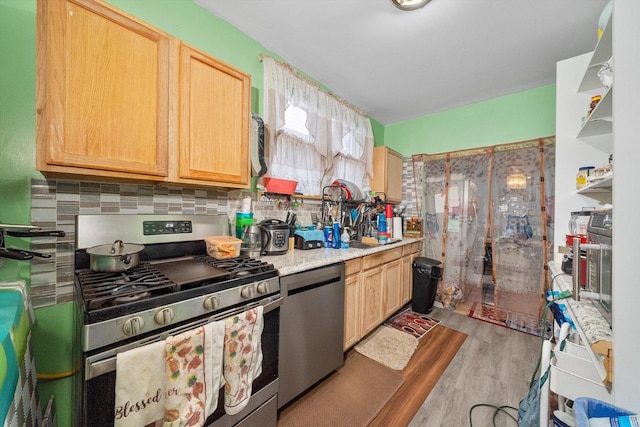 8325 S Dante Ave, Chicago, IL 60619 - kitchen with stainless steel appliances, tasteful backsplash, light brown cabinets, and wood finished floors