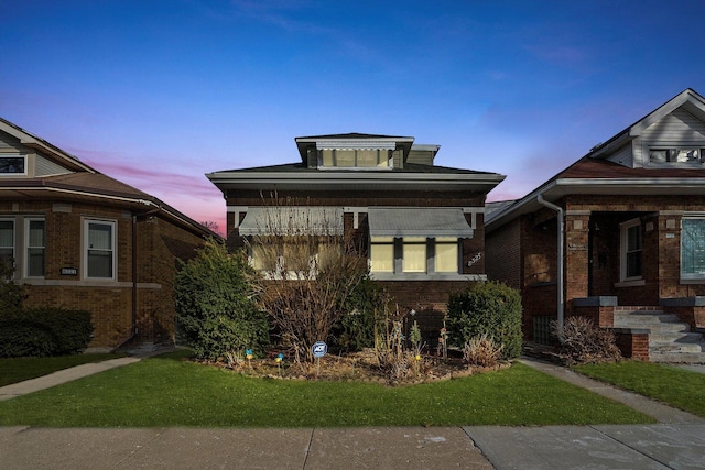 8325 S Dante Ave, Chicago, IL 60619 - bungalow-style home with a front yard and brick siding