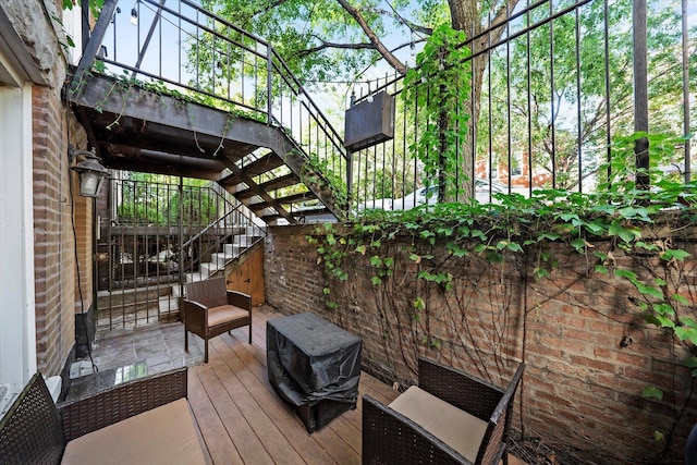 wooden deck featuring stairs