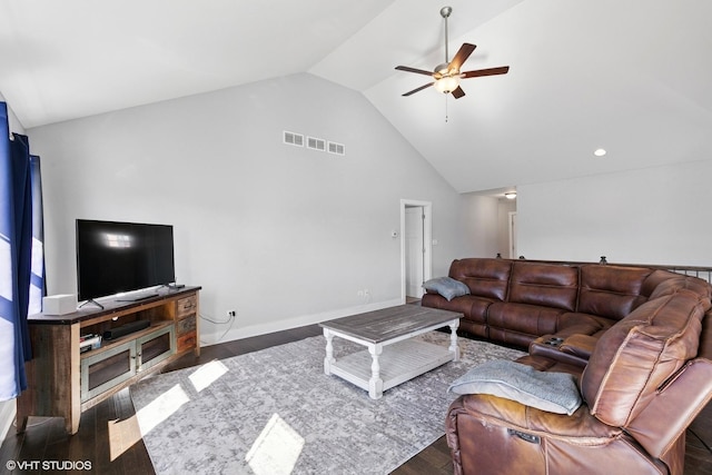 living area with visible vents, baseboards, ceiling fan, and wood finished floors