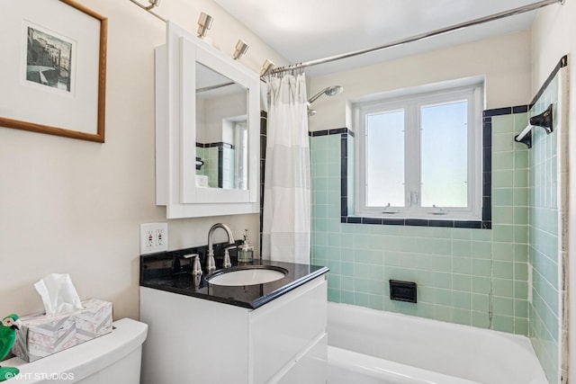 bathroom with toilet, shower / bath combo with shower curtain, and vanity