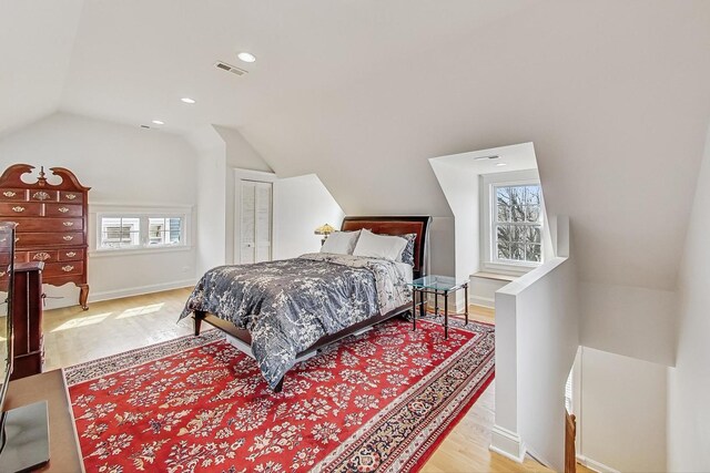 bedroom featuring baseboards, ceiling fan, and hardwood / wood-style flooring