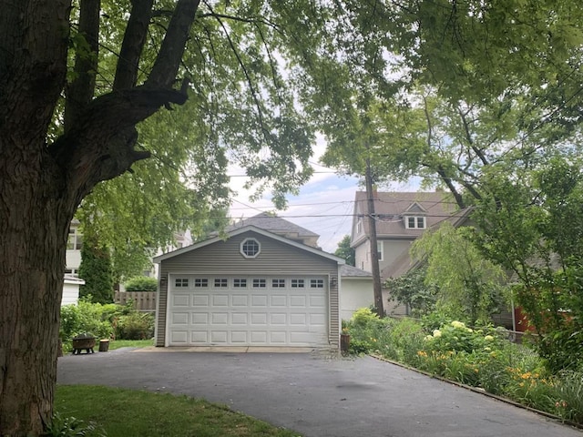 garage with fence