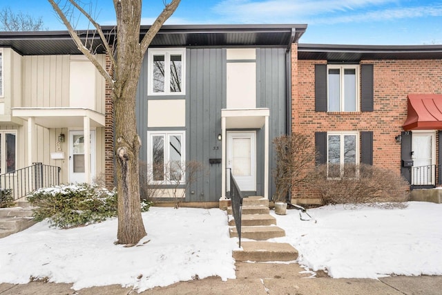 multi unit property featuring brick siding