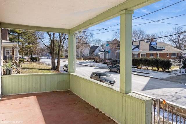 view of patio featuring a residential view and covered porch