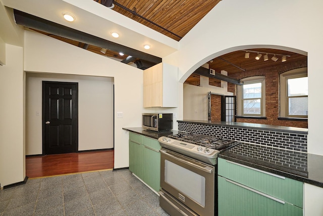 kitchen with baseboards, granite finish floor, stainless steel appliances, dark countertops, and wooden ceiling