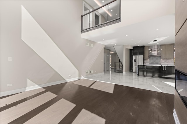 interior space with visible vents, recessed lighting, baseboards, and light wood-style floors