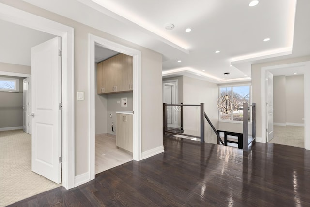 additional living space with carpet floors, recessed lighting, baseboards, and wood finished floors