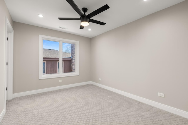 unfurnished room featuring a ceiling fan, visible vents, carpet, and recessed lighting