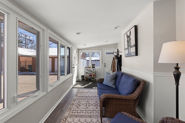 sunroom featuring recessed lighting, lofted ceiling, and wood finished floors