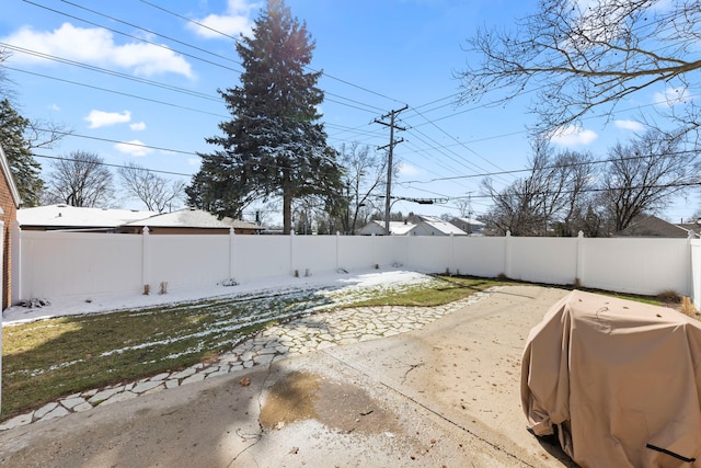 view of yard featuring a patio and a fenced backyard