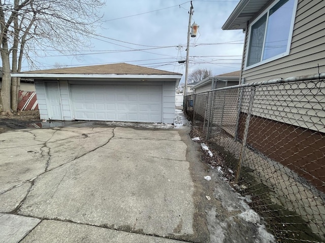 detached garage with fence