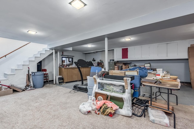 finished basement featuring stairs