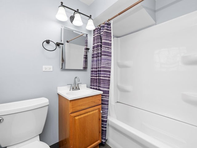 bathroom featuring toilet, vanity, and shower / bath combination with curtain