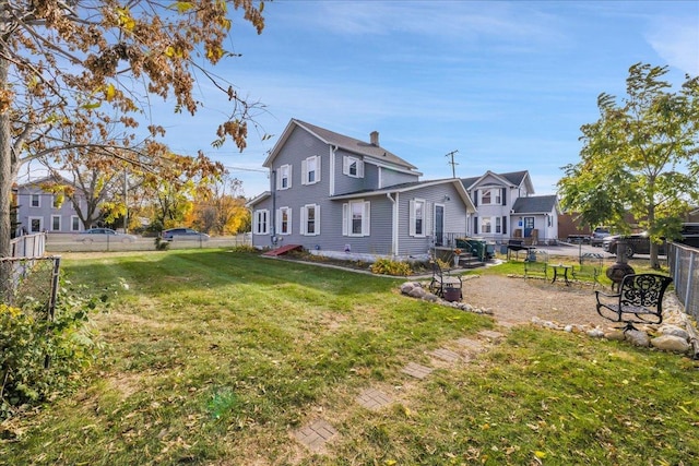 exterior space featuring a fenced backyard