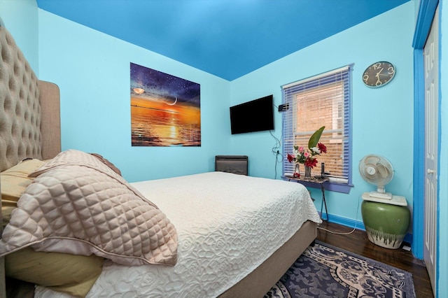 1418 N Mayfield Ave, Chicago, IL 60651 - bedroom featuring dark wood-style floors and baseboards