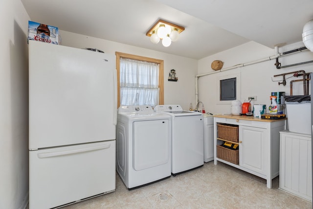 washroom with independent washer and dryer