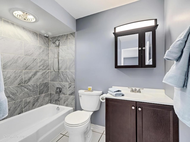 full bathroom featuring toilet, shower / washtub combination, vanity, and tile patterned flooring