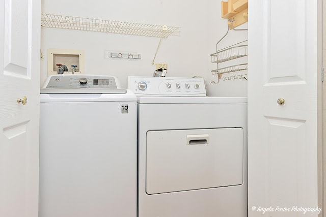 washroom with laundry area and washing machine and clothes dryer