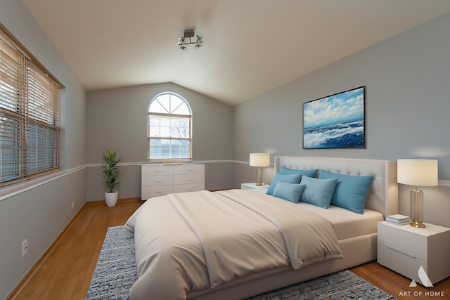 bedroom with vaulted ceiling, light wood-style floors, and baseboards