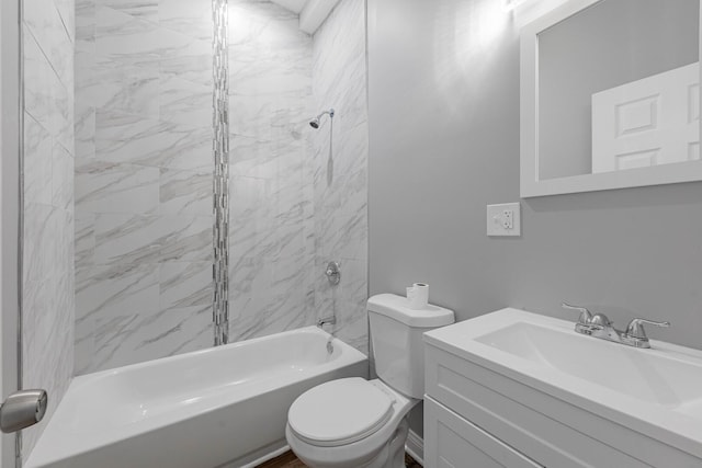 bathroom with shower / washtub combination, toilet, and vanity