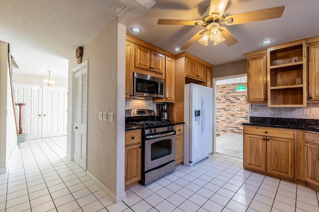 kitchen featuring open shelves, light tile patterned flooring, backsplash, and stainless steel appliances