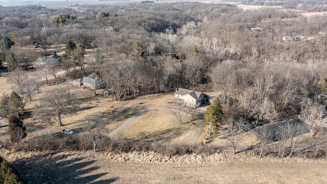 bird's eye view featuring a rural view and a wooded view