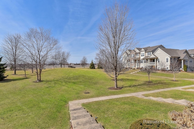 view of yard featuring a residential view