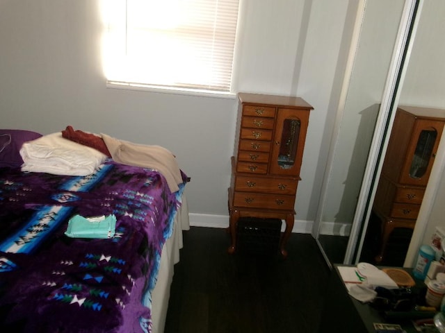 bedroom featuring baseboards