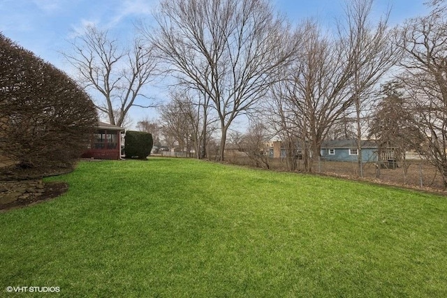 view of yard with fence