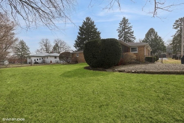 view of yard with fence