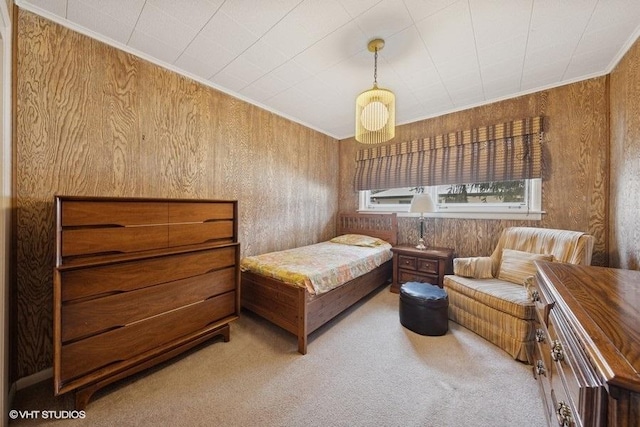 bedroom featuring carpet and ornamental molding